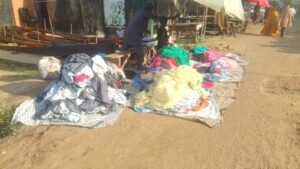 Second hand clothing offered for reuse at a market
