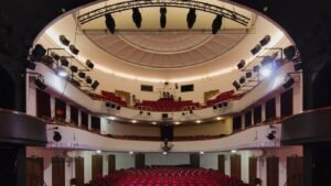 The auditorium of a theatre seen from the stalls