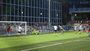 An empty grassroots football pitch with goalposts