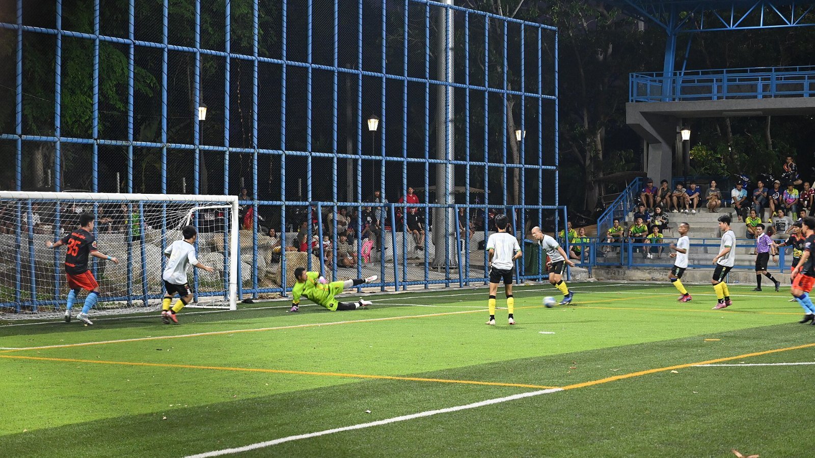An empty grassroots football pitch with goalposts