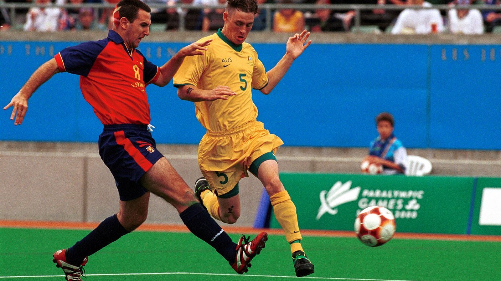 Players competing for the ball during a football match