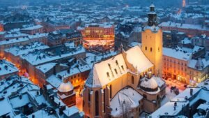 Heavy snow blanketing a European city street