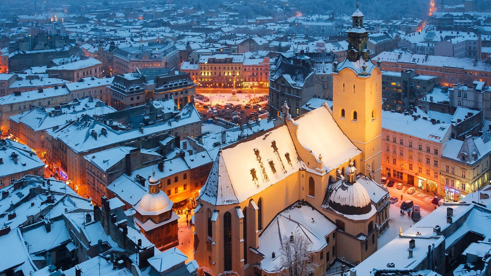 Heavy snow blanketing a European city street