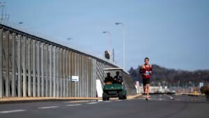 Runners building stamina during a road race