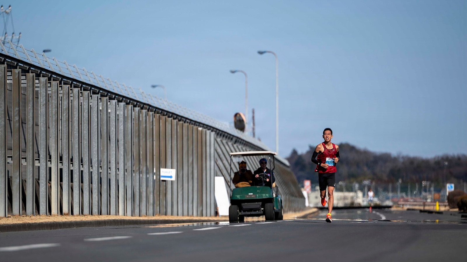 Runners building stamina during a road race