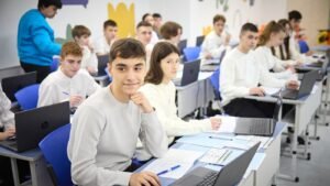 A learner studying at a laptop