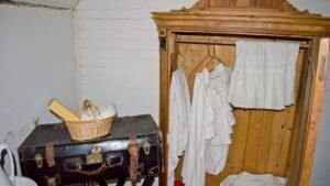 A pared back wardrobe of hanging clothes