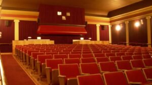 The interior of a cinema auditorium before a screening