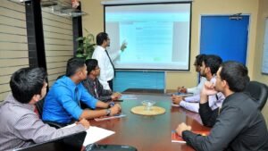 Colleagues meeting around a table in a modern office