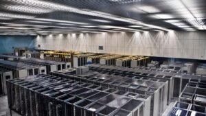Rows of servers in a data centre supporting artificial intelligence systems